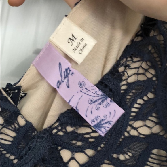 Navy blue lace dress with nude underlay - Picture 3 of 5